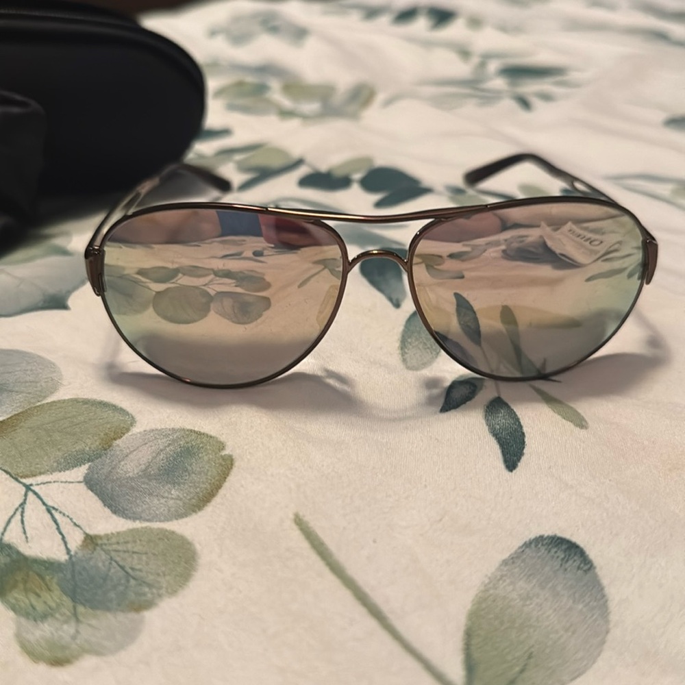 Women's Oakley sunglasses, worn one time, brand new condition